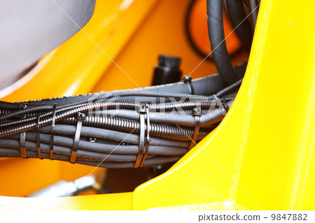 Hydraulic connections of a machinery industrial detail Hydraulic connections of a machinery industrial detail 9847882