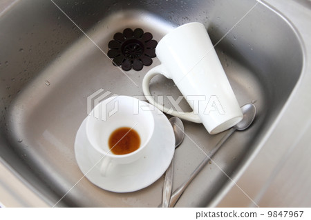Dishwashing. White dishes in the kitchen sink. Dishwashing. White dishes in the kitchen sink. 9847967