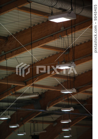 Group of lamps on sport stadium celling. Light power energy Group of lamps on sport stadium celling. Light power energy 9848405