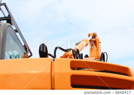 Detail of hydraulic bulldozer sky background Detail of hydraulic bulldozer sky background 9848417