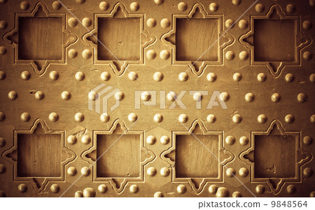 Old wooden background with metal rivets vintage door detail 9848564