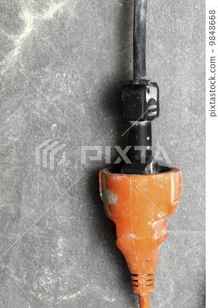 electrical plug in the electric extension cord electrical plug in the electric extension cord 9848668