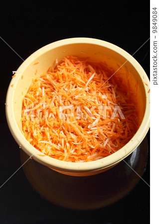 grated carrots in a bowl vegetables salad 9849084