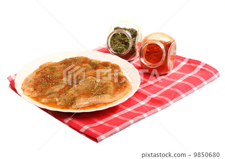 Raw marinated chicken breasts with spices 9850680