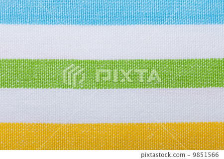 Closeup of colorful striped textile as background or texture Closeup of colorful striped textile as background or texture 9851566