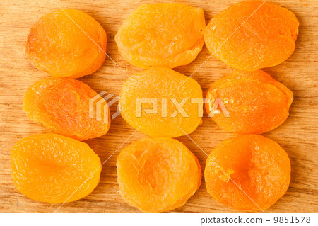 Dried apricots set on wooden table background. Dried apricots set on wooden table background. 9851578
