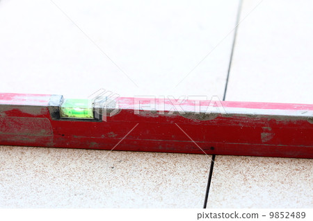 level red Tiles on a floor 9852489