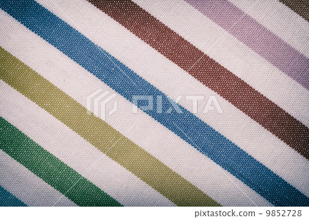 Closeup of colorful striped textile as background or texture Closeup of colorful striped textile as background or texture 9852728