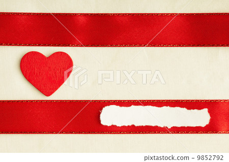 Valentines day background. Red satin ribbon and heart. 9852792