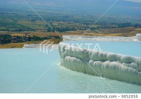 Travertine pools and terraces with water, Pamukkale, Turkey 9852858