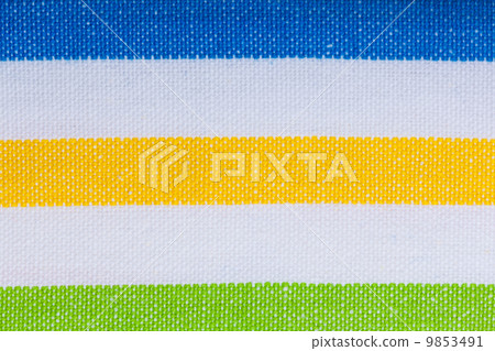 Closeup of colorful striped textile as background or texture Closeup of colorful striped textile as background or texture 9853491