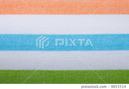 Closeup of colorful striped textile as background or texture Closeup of colorful striped textile as background or texture 9853514