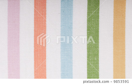 Closeup of colorful striped textile as background or texture Closeup of colorful striped textile as background or texture 9853591