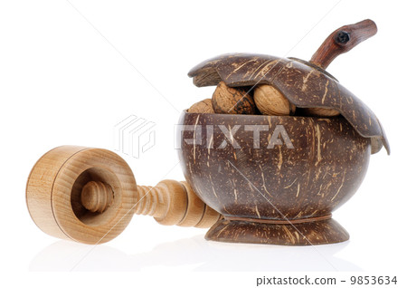 Walnuts and nutcracker Walnuts and nutcracker 9853634
