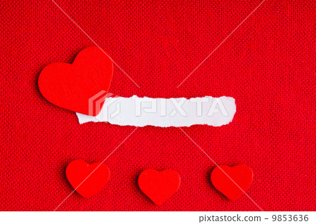 Piece paper blank copyspace hearts on red fabric textile material Piece paper blank copyspace hearts on red fabric textile material 9853636
