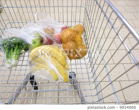 shopping cart with grocery at supermarket 9854008