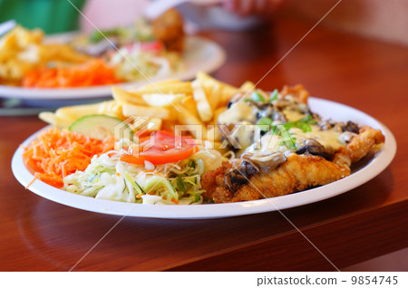 chicken steak with fries / chips and salad chicken steak with fries / chips and salad 9854745