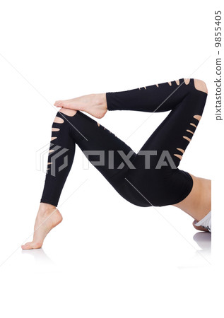 Woman legs with stockings on white Woman legs with stockings on white 9855405