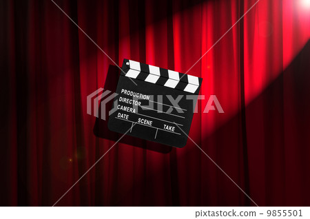 Movie clapper board against curtain 9855501