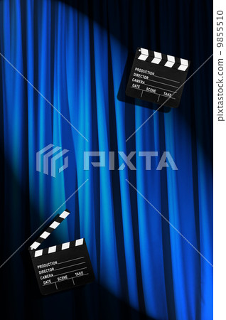 Movie clapper board against curtain 9855510