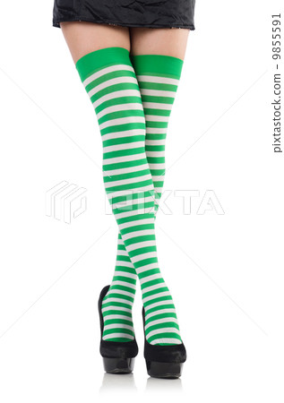 Woman legs with stockings on white Woman legs with stockings on white 9855591