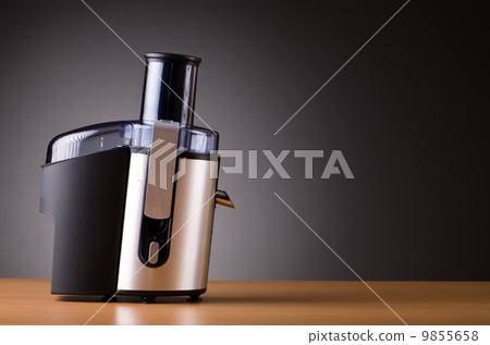 Juice extractor in kitchenware concept Juice extractor in kitchenware concept 9855658