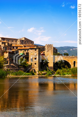 Medieval town on the banks of  river 9856172