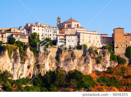 Day picturesque view of houses on rock in Cuenca Day picturesque view of houses on rock in Cuenca 9856355