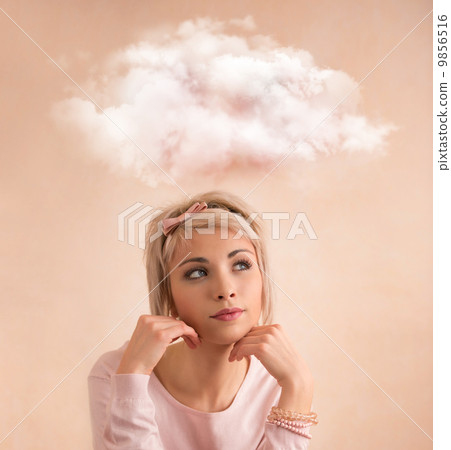 Close up of young woman looking away with thought bubble above h Close up of young woman looking away with thought bubble above h 9856516