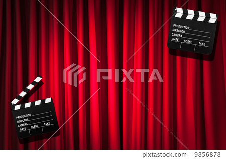 Movie clapper board against curtain 9856878