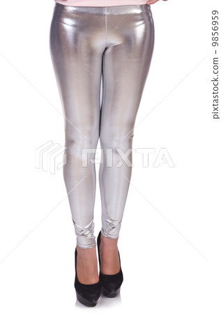 Woman legs with stockings on white 9856959