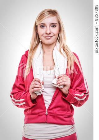 Fitness sport woman white towel on shoulders, studio shot 9857899