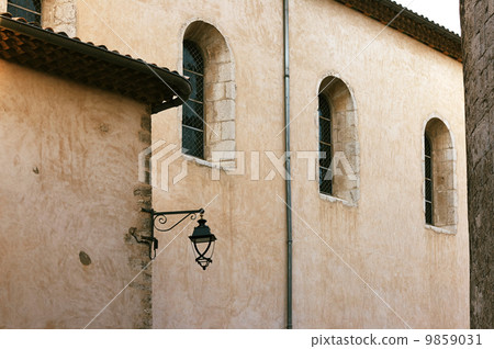Old lantern on the wall of a house 9859031