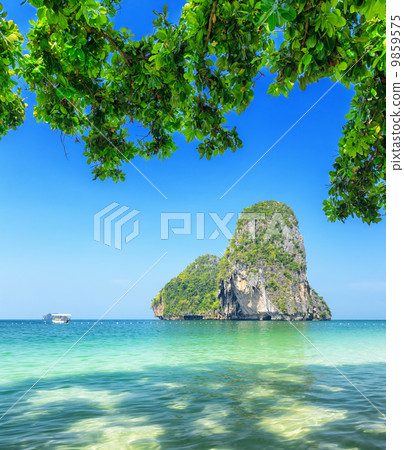 Clear water and blue sky. Phra Nang beach, Thailand Clear water and blue sky. Phra Nang beach, Thailand 9859575