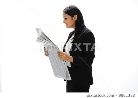 Asia Young India Businesswoman Reading A Newspaper 9861388