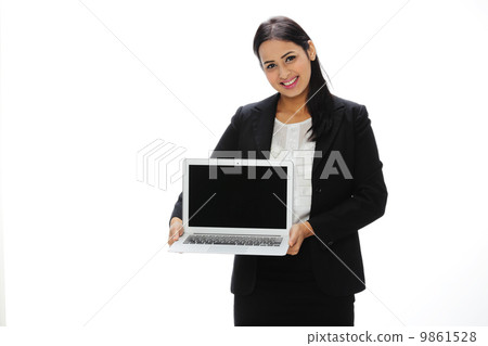 Asia Young Indian Businesswoman Holding A Laptop . Asia Young Indian Businesswoman Holding A Laptop . 9861528