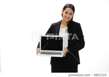Asia Young India Businesswoman Holding A Laptop . Asia Young India Businesswoman Holding A Laptop . 9861529
