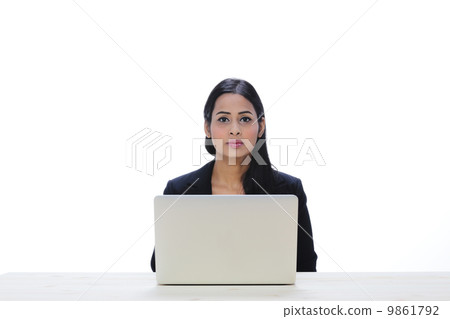 Asia Young Indian Businesswoman Sitting With A Laptop . Asia Young Indian Businesswoman Sitting With A Laptop . 9861792