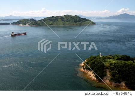 Cargo ship passing through Kurushima Strait 9864941