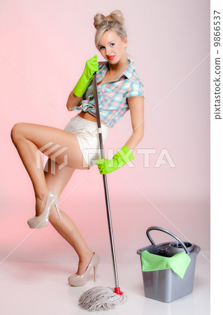 Stock Photo: Sexy girl retro style, woman housewife cleaner with mop