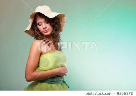 Beautiful spring woman portrait. Green concept 9866578