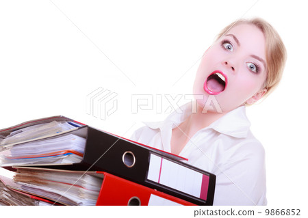 Overworked business woman with stack folder document screaming Overworked business woman with stack folder document screaming 9866852