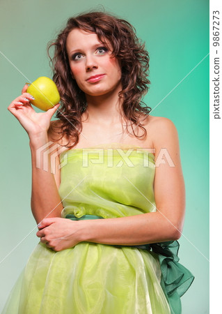 Beautiful spring woman with apple. Green concept 9867273