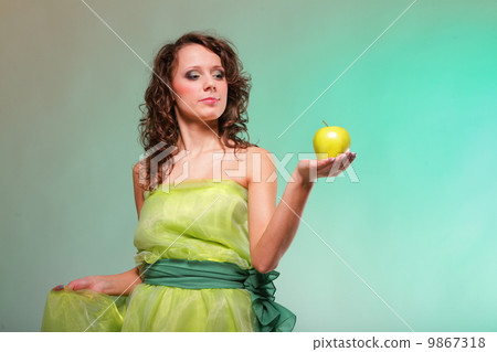 Beautiful spring woman with apple. Green concept Beautiful spring woman with apple. Green concept 9867318
