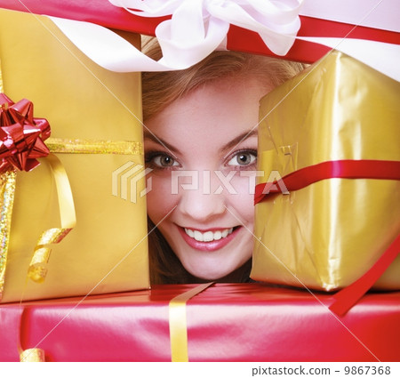 Happy cheerful girl with many christmas gift boxes. Holiday. Happy cheerful girl with many christmas gift boxes. Holiday. 9867368