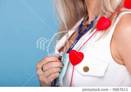 woman in nurse suit with stetoscope red heart 9867611