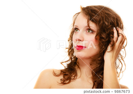 Portrait pretty thoughtful woman curly hair isolated Portrait pretty thoughtful woman curly hair isolated 9867673