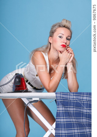 pin up girl retro style portrait woman ironing 9867675