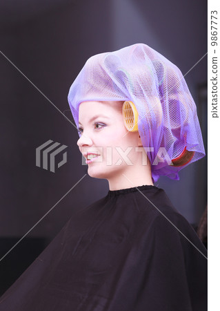 Beautiful blond girl hair curlers rollers hairdresser beauty salon Beautiful blond girl hair curlers rollers hairdresser beauty salon 9867773