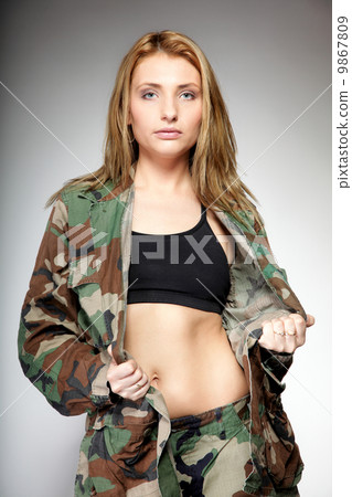 Beautiful woman in military clothes. Beautiful woman in military clothes. 9867809